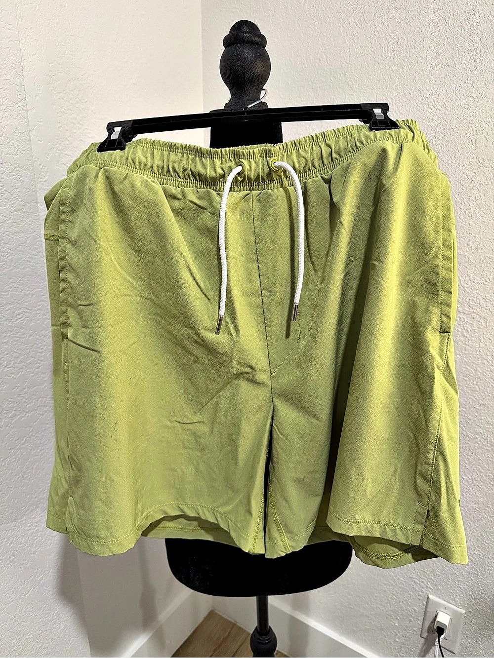 Green athletic shorts